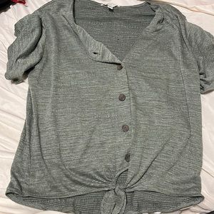 Green everyday button up shirt.